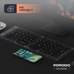 کیبورد شفاف تاشو Porodo متصل به گوشی آیفون در محیط کاری